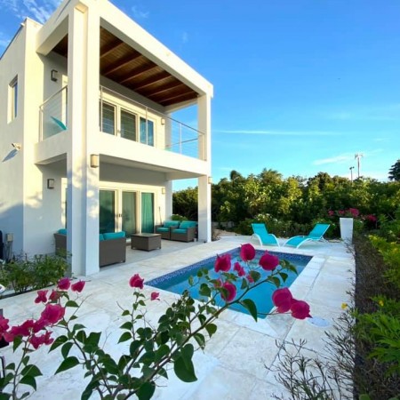 The pool patio and outdoor area at Gracehaven Villa Providenciales, Turks and Caicos